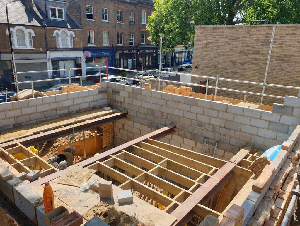 First-floor construction and brickwork in progress on a new build project in West Hampstead by Optima Builders