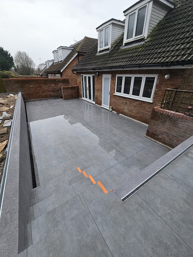 Basement cinema room renovation with waterproofing and preparations for glass balustrade to separate children's play area in Hertfordshire