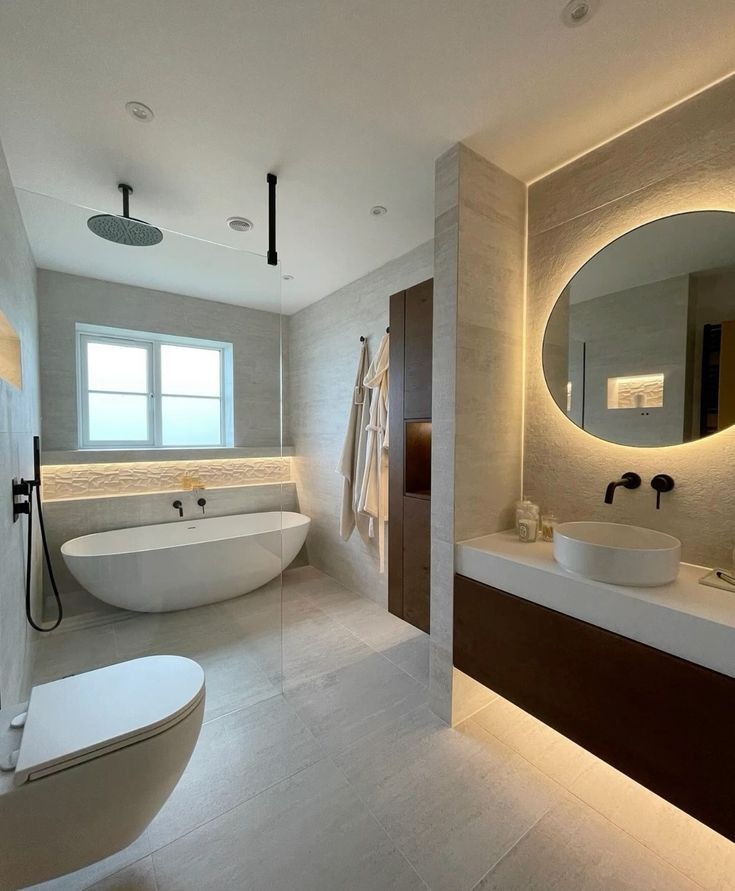 Luxury bathroom installation with walk-in shower, freestanding bath and bespoke finishes in North London