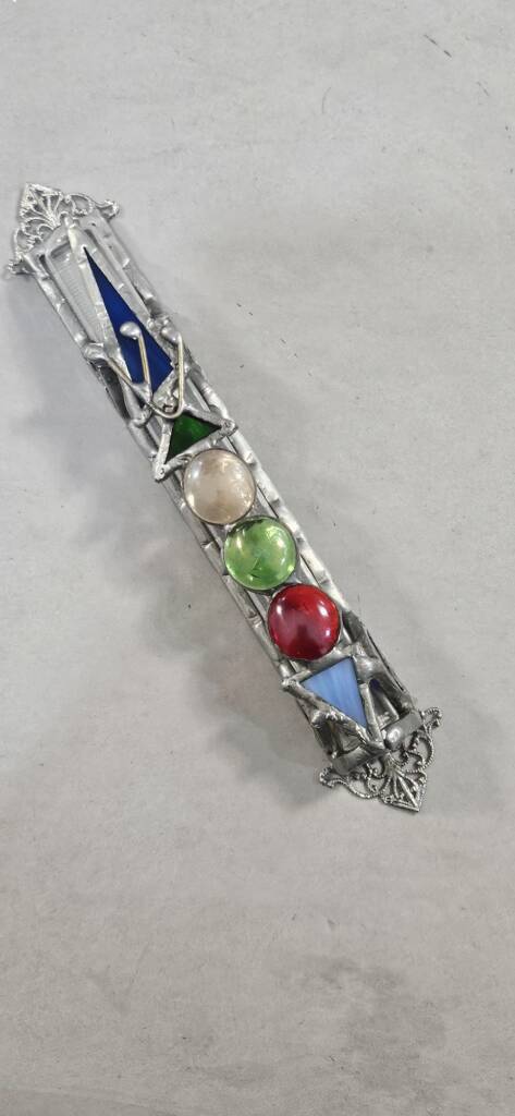 Vintage silver-toned mezuzah case with coloured glass cabochons and geometric inlays