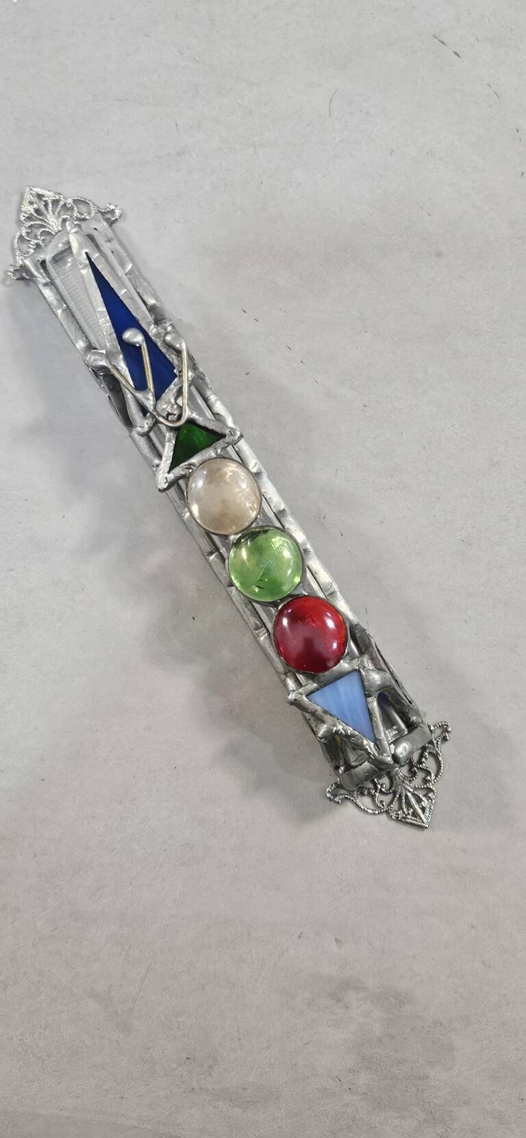 Vintage silver-toned mezuzah case with coloured glass cabochons and geometric inlays